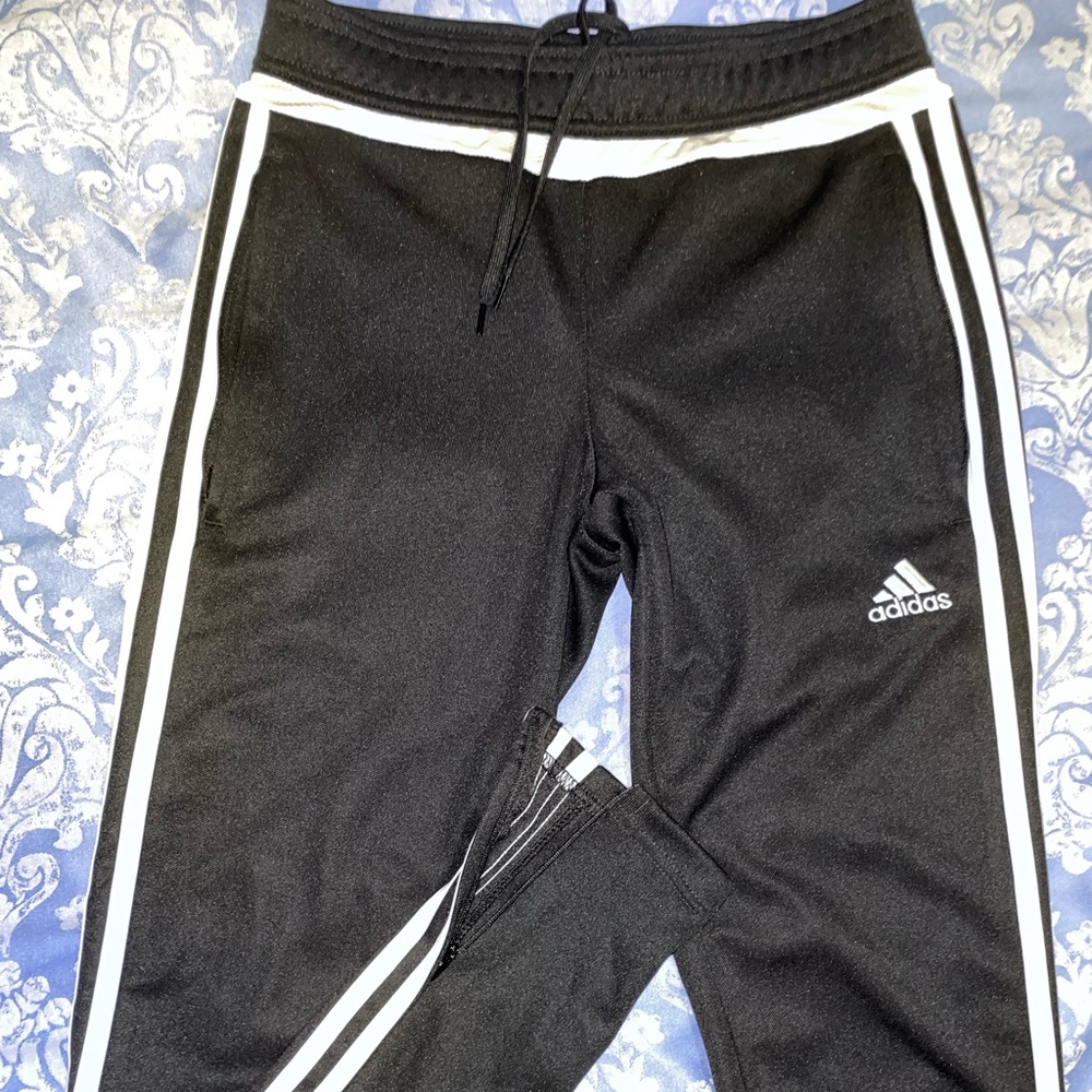 Adidas black track pants with double white stripes